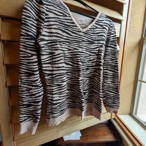 Black and Cream V-Neck Sweater with Bold Animal Print